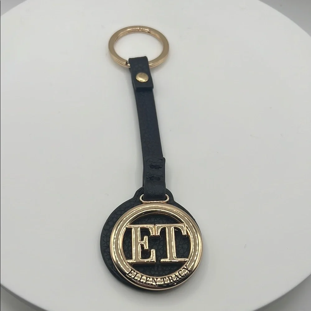 858. Ellen Tracy Black and Gold Keychain